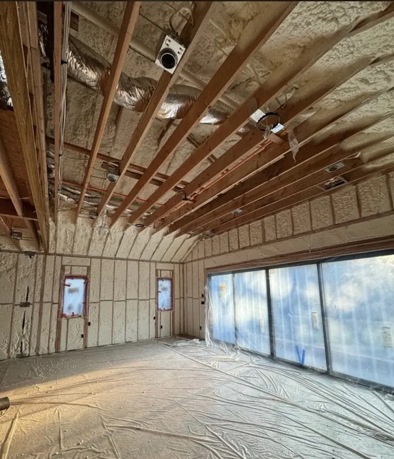 Interior walls and ceiling insulated with spray foam during new construction in Dumfries